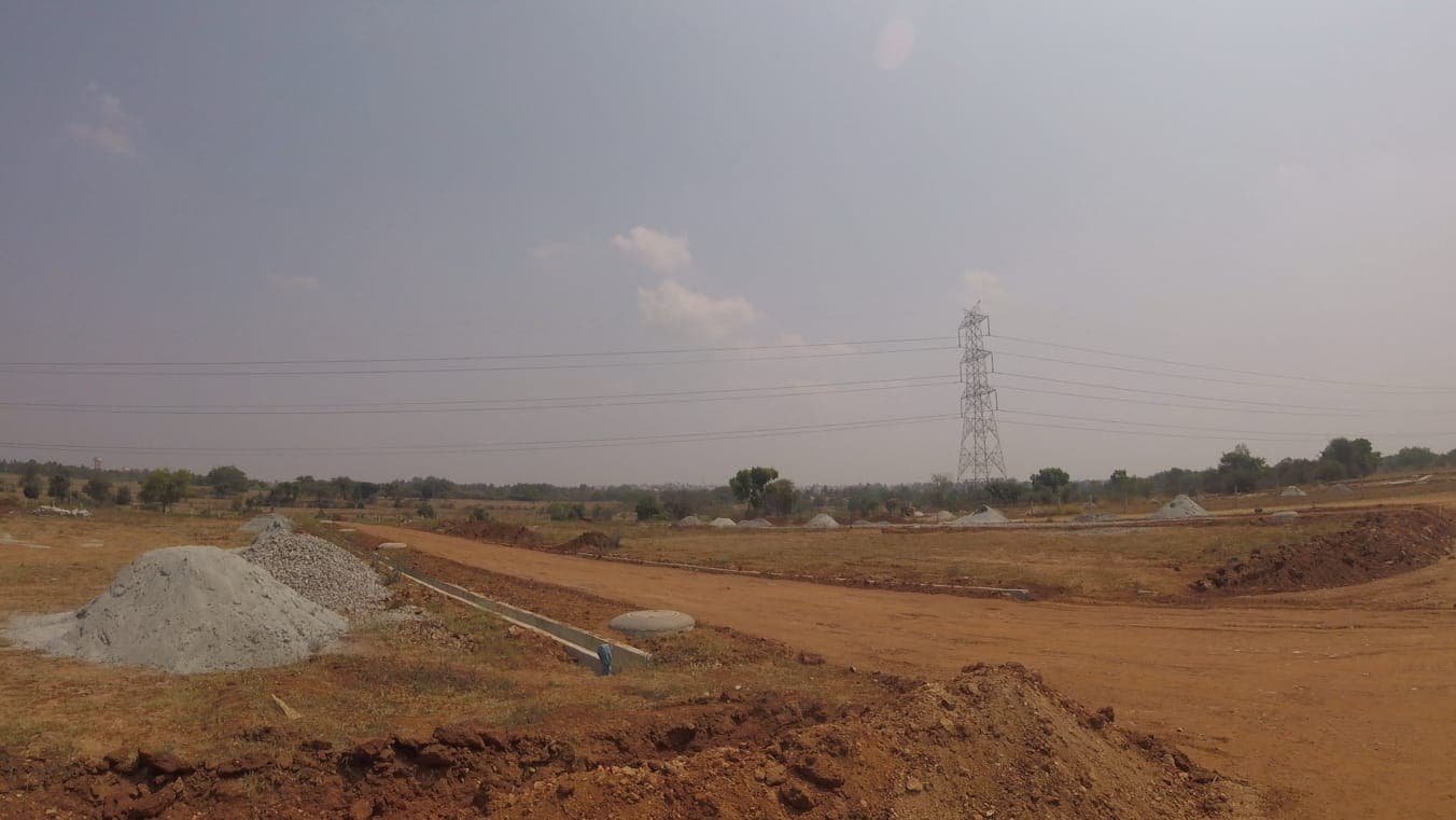 Brindhavan Layout site with roads and drains being laid